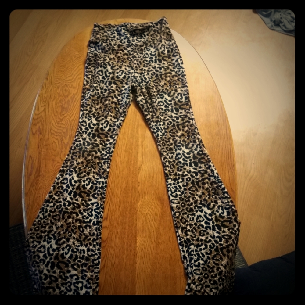 Brown white and black cheetah print pants